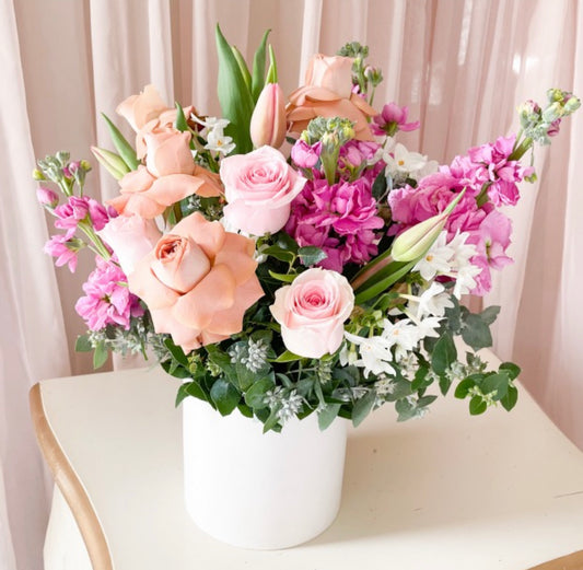 A Posy Story in a White Vase